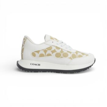 Zapatilla blanca y dorada.